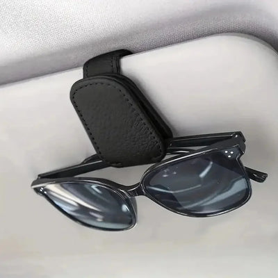 Magnetic leather sunglasses clip for car visor—keeps your glasses secure.