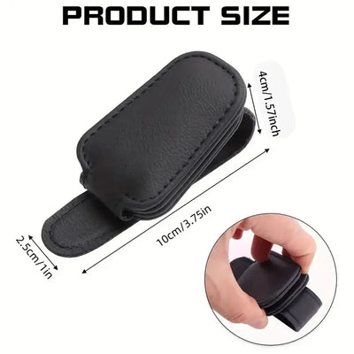 Car interior sunglasses hanger with magnetic design and leather finish.